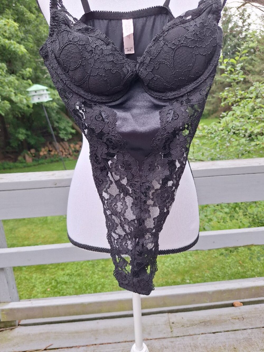Black lace thong bodysuit with 34 B Push Up Push up bra.